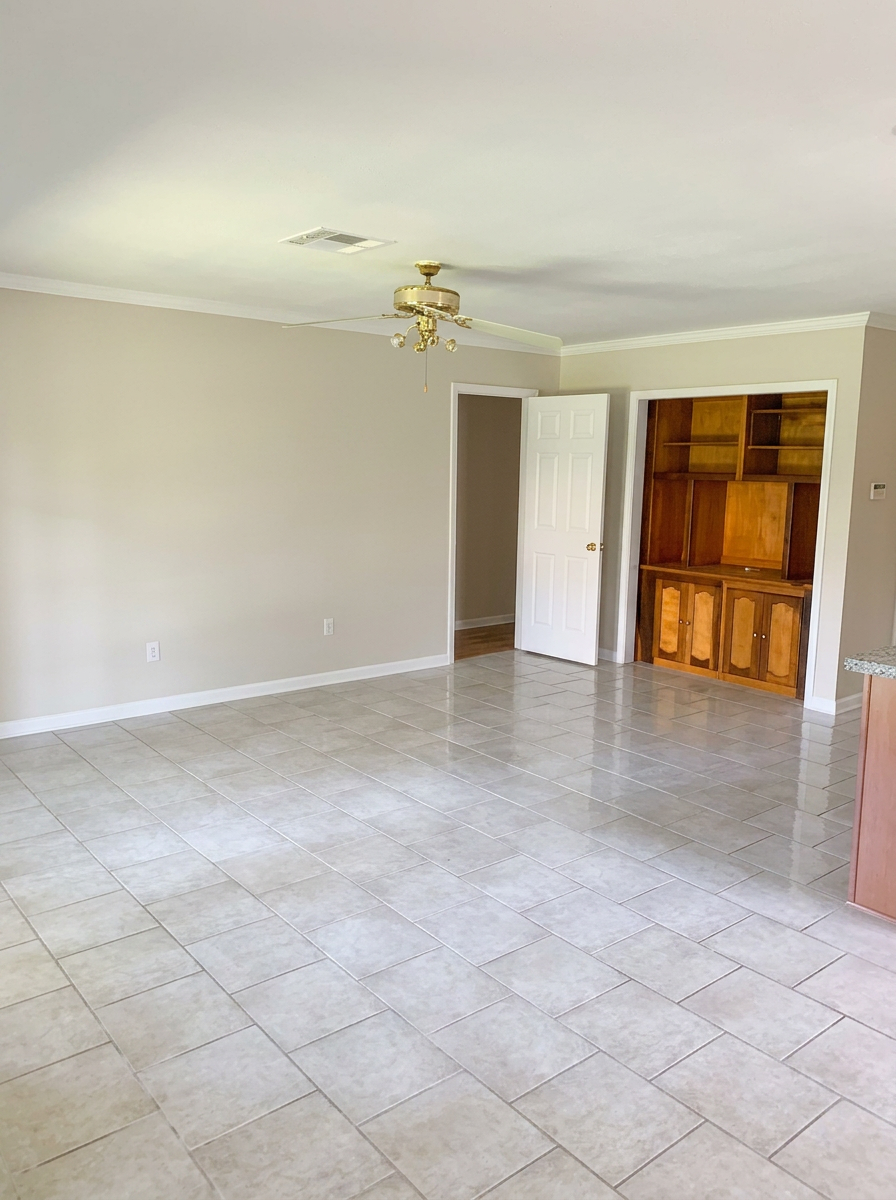Spacious living room with tile floors
